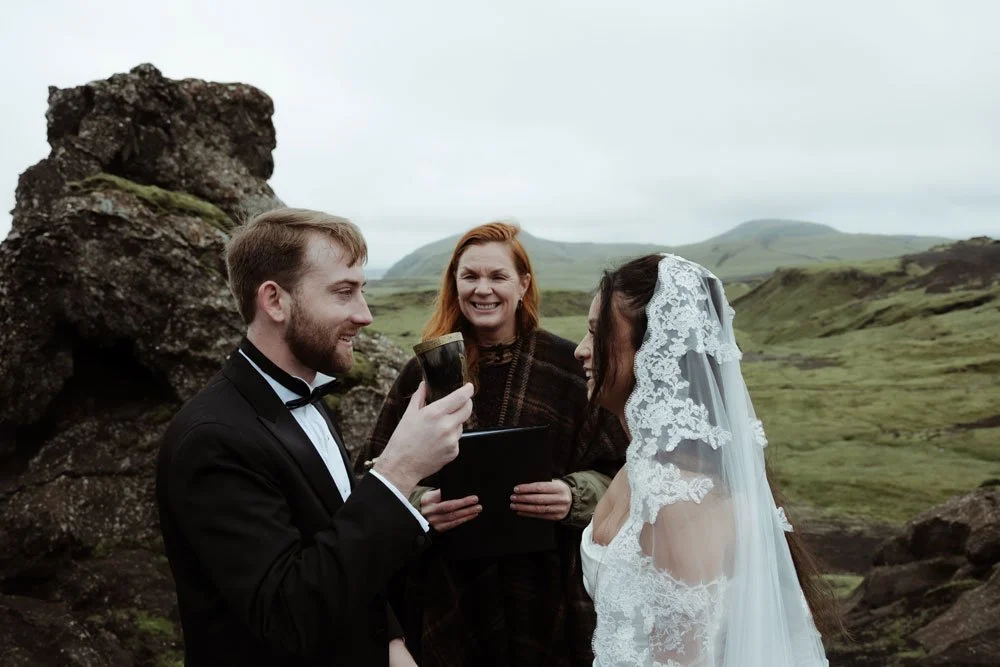 groom smiling during intimate Iceland wedding ceremony