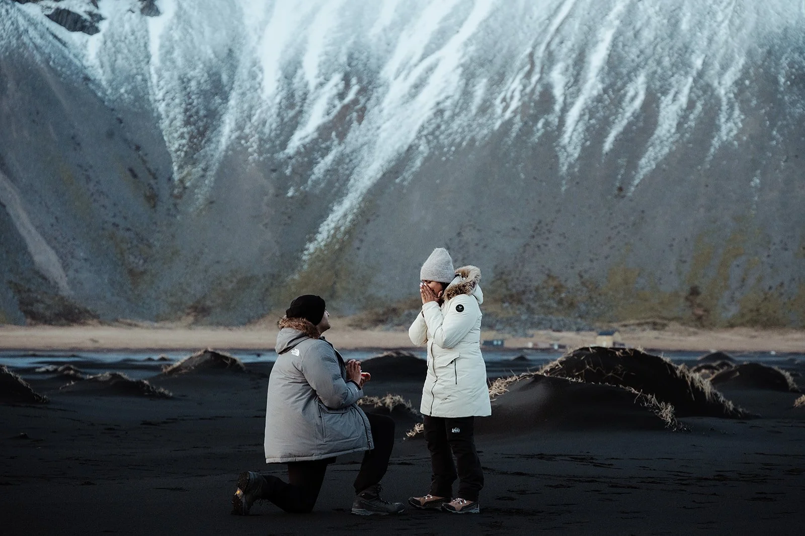 surprise proposal on black sand beach in Iceland