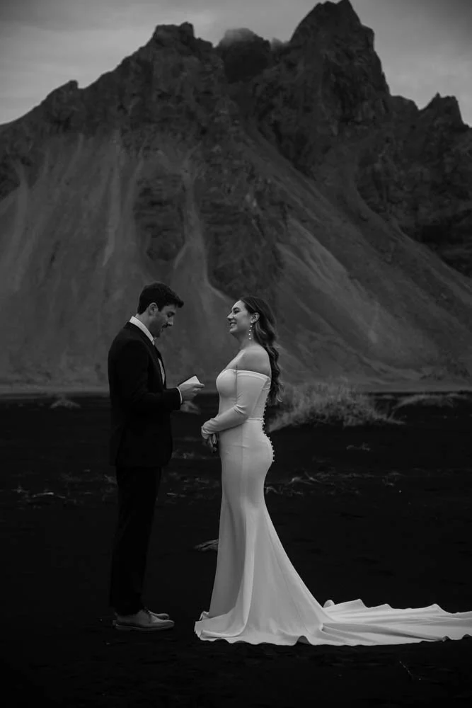 A couple exchanges private vows beneath Vestrahorn during their Iceland elopement in Southeast Iceland.