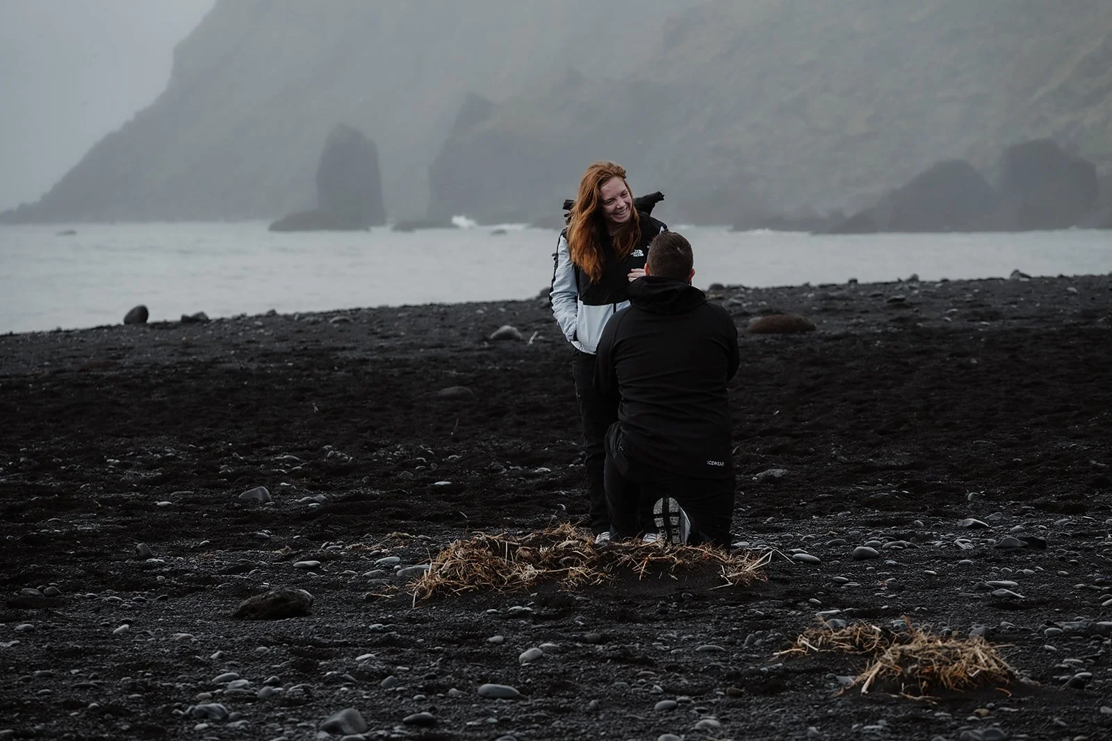 emotional black sand beach proposal in Iceland