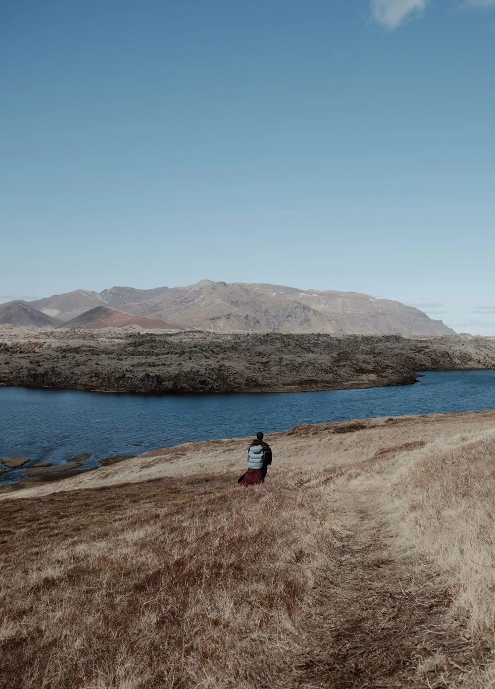 romantic hiking proposal in Iceland waterfall landscape