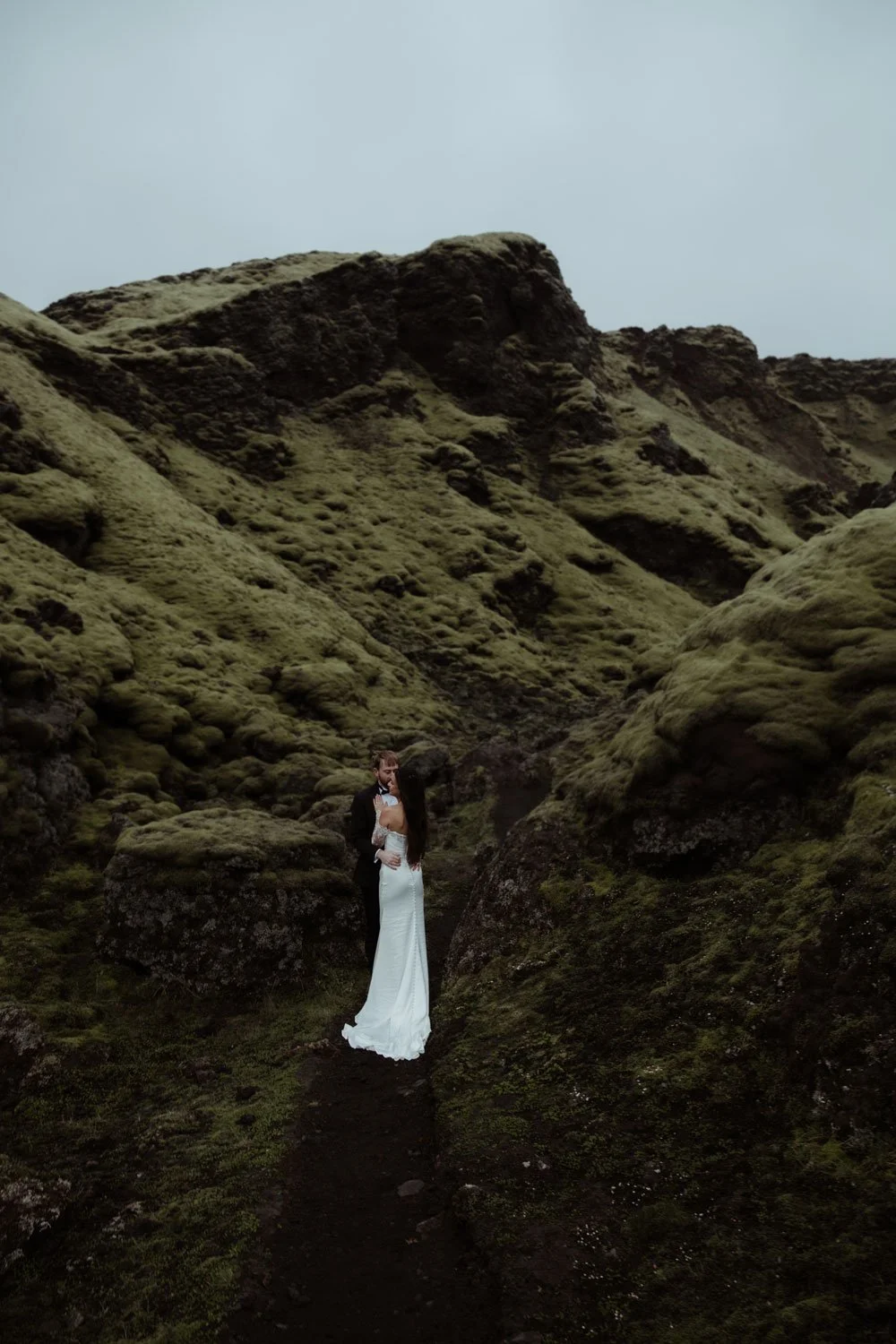 newly married couple exploring Iceland volcanic landscapes