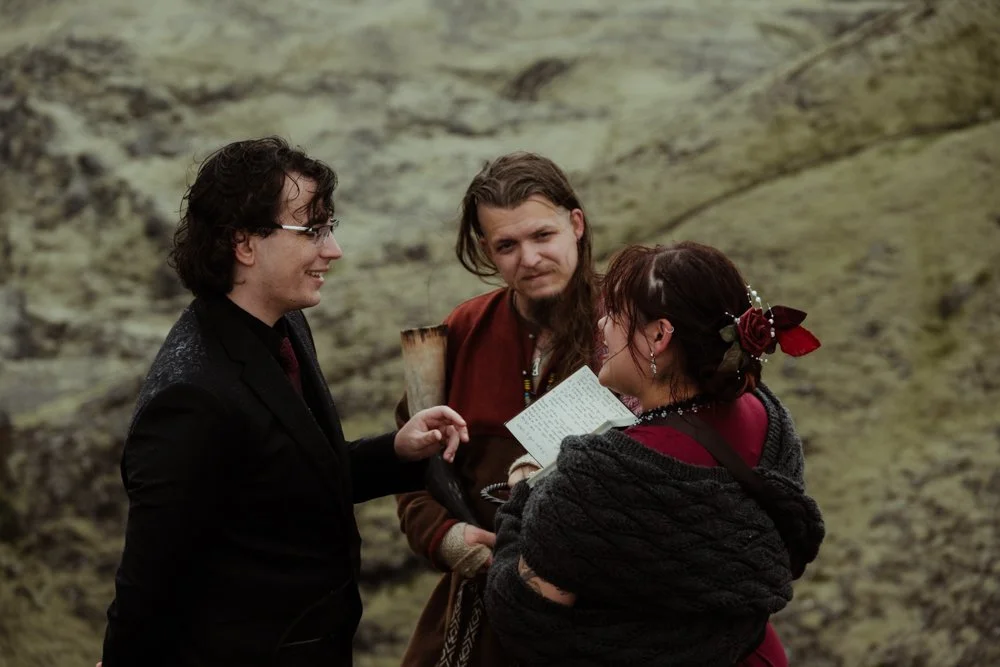Chey and Joe exchanging vows during their Ásatrú ceremony in Snæfellsnes.
