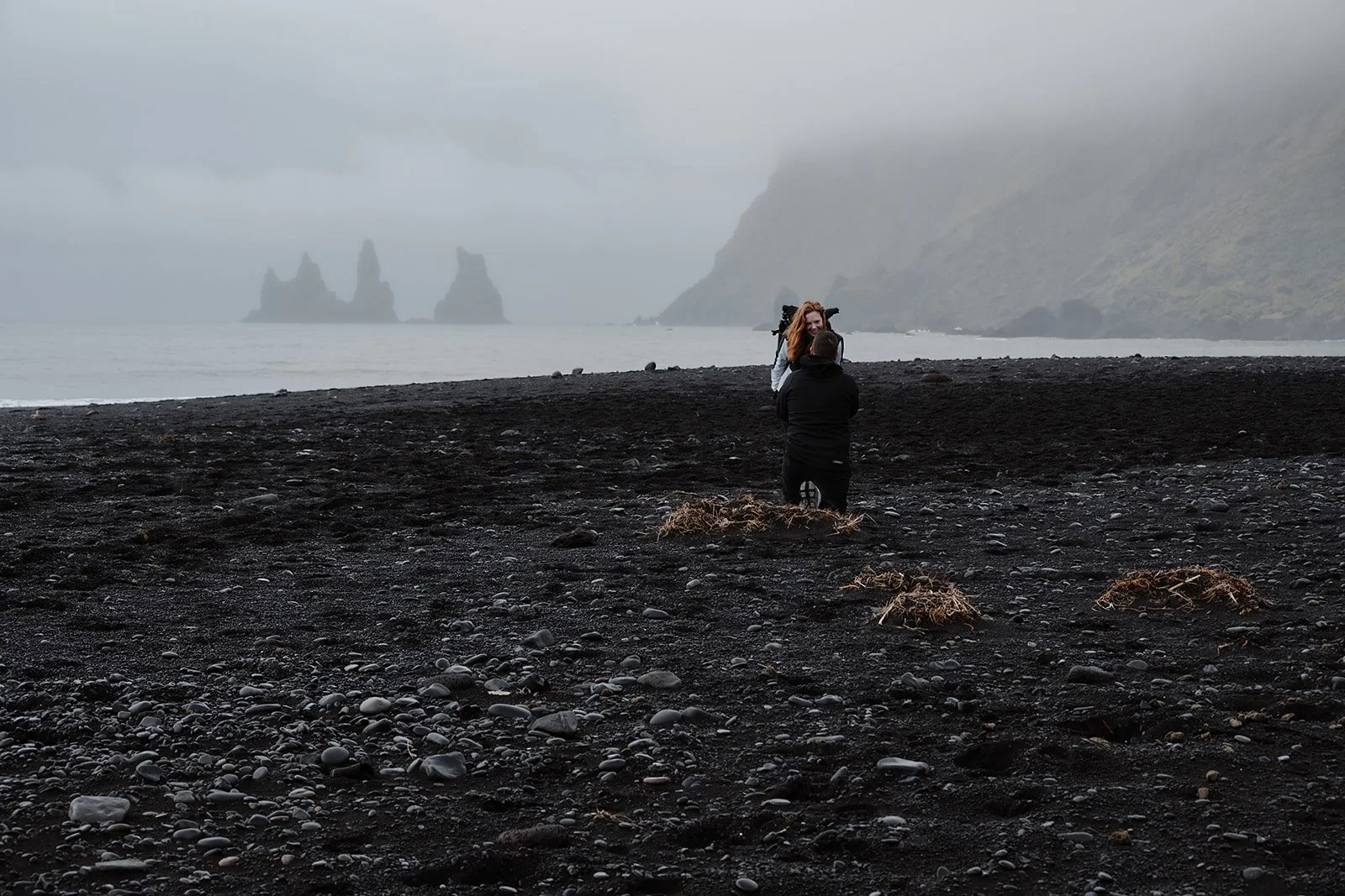 romantic proposal on South Iceland black sand beach