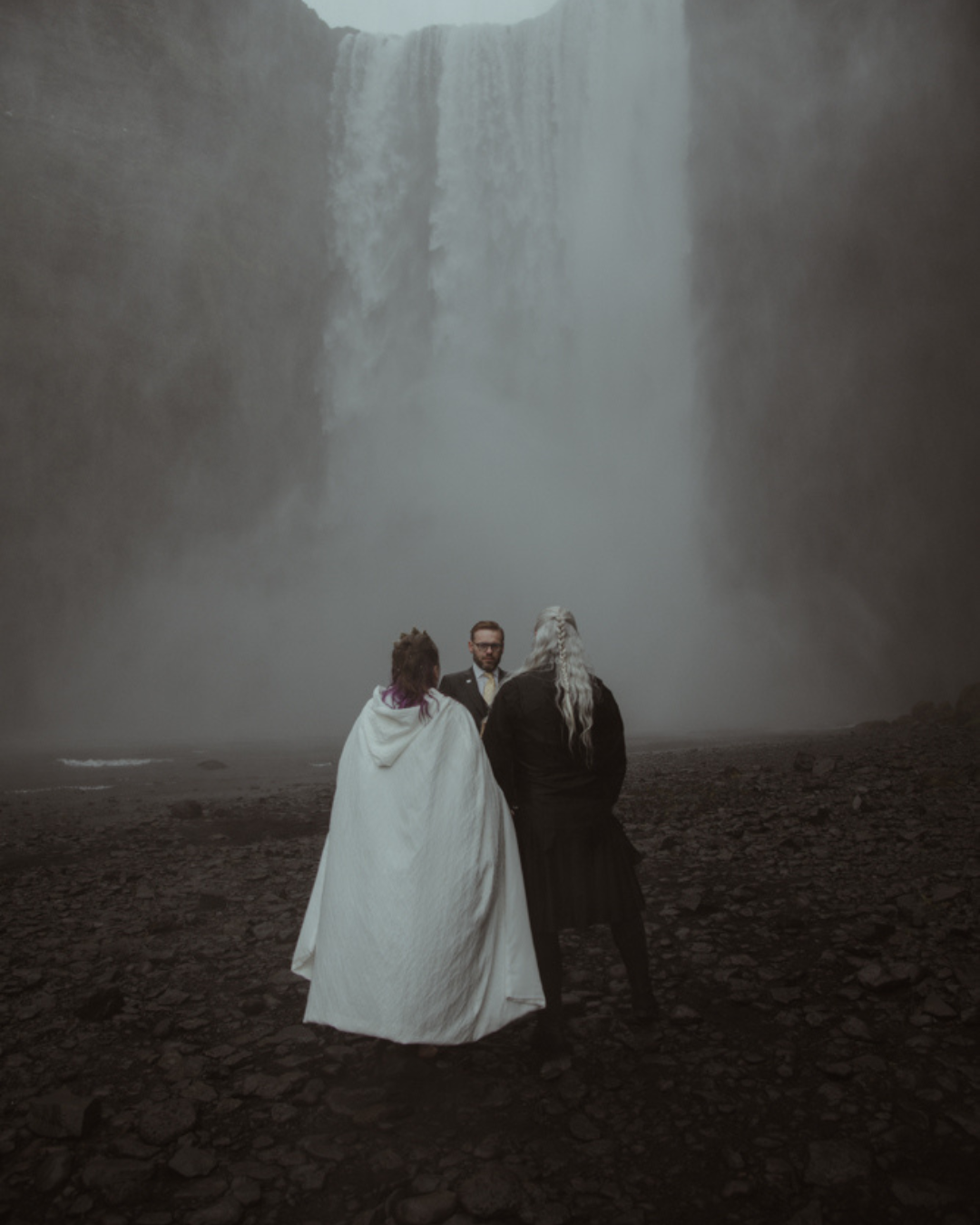 an elopement ceremony by a waterfall