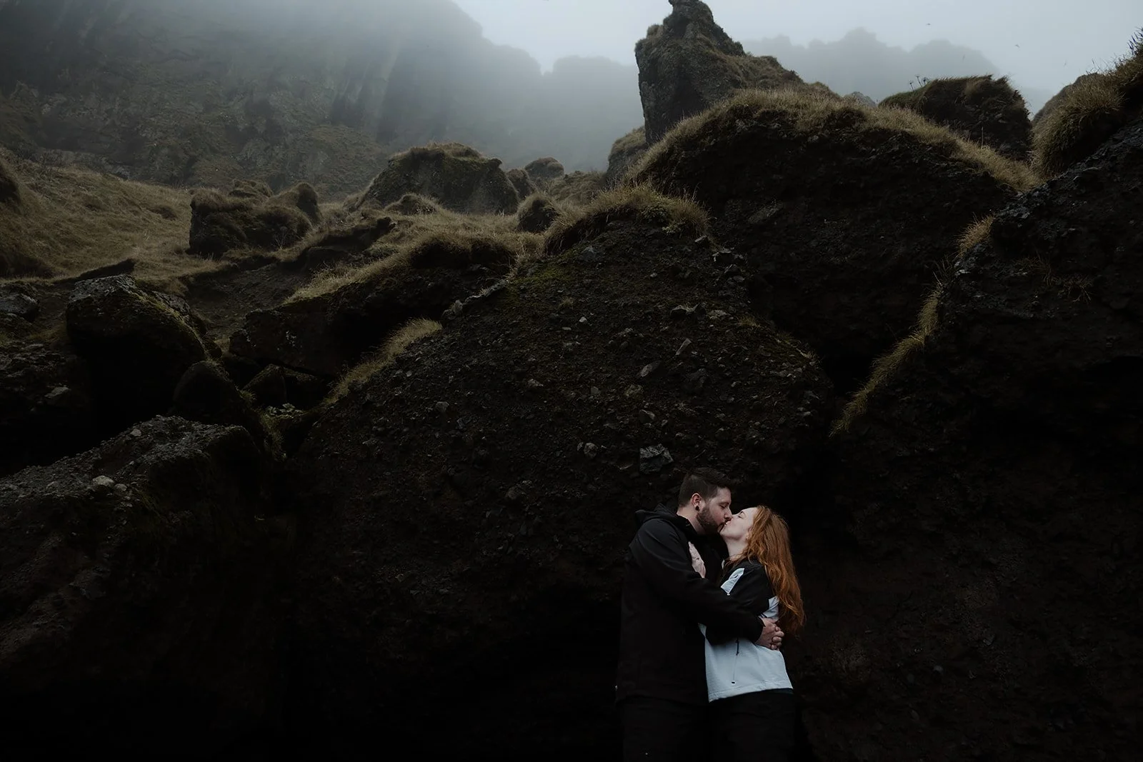 couple embracing after proposal in Vík Iceland