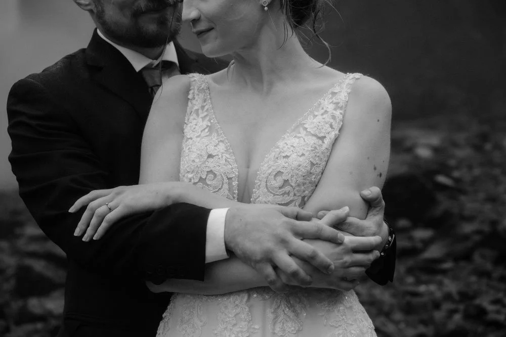 wedding couple embracing after wedding vows at Háifoss waterfall