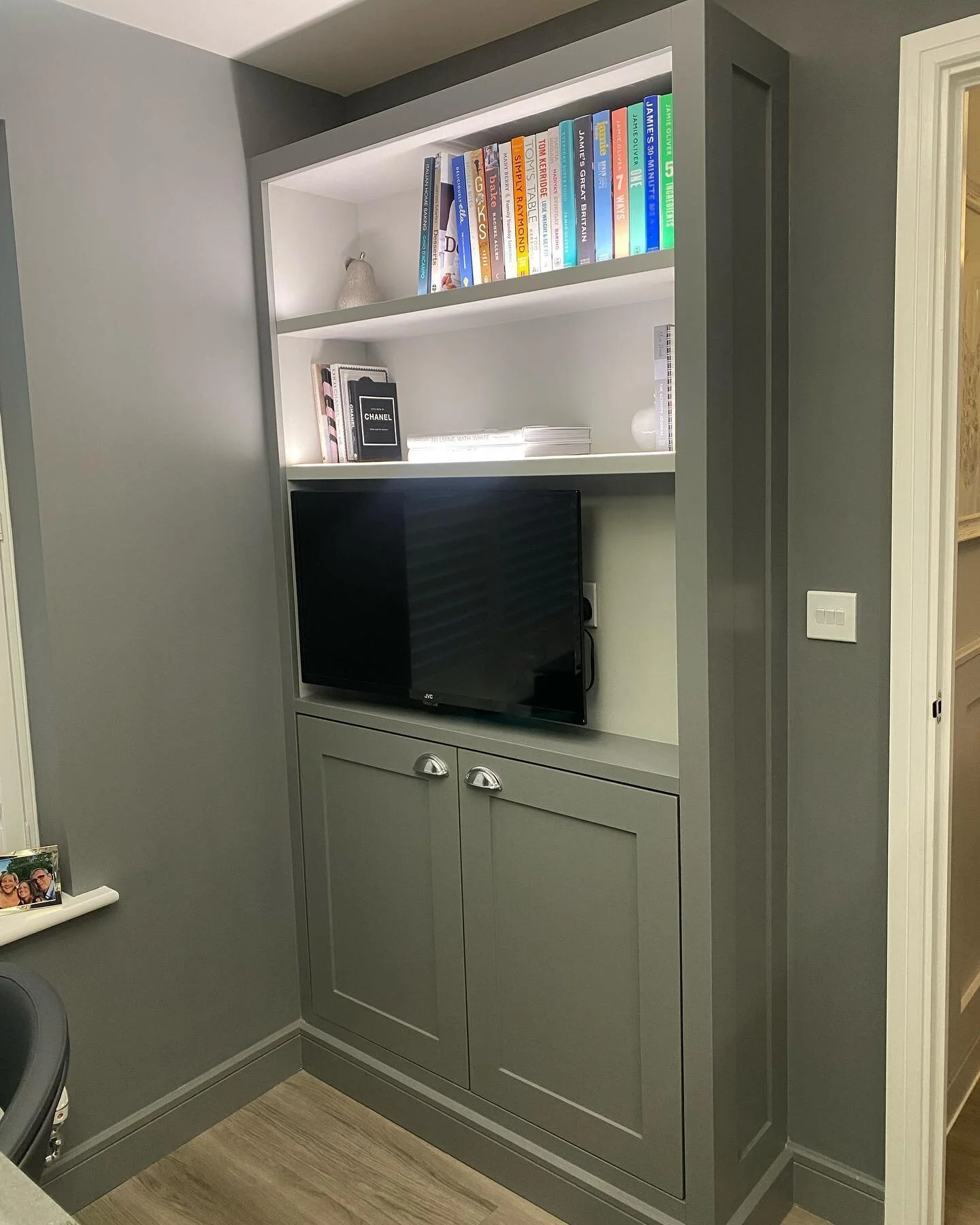 This little unit was fitted in a kitchen to house the tv and hide all the cables, 2 door shaker cupboard below. With shelves above with led lighting. Colour matched with the walls. #Fitted #FittedFurniture #Cabinet #CabinetDesign #Cabinetry #Bespoke