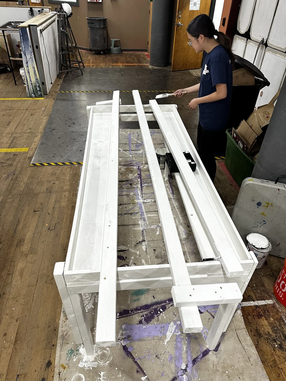 Clark intern Angela Ruan builds the Community Map Table at Technocopia.