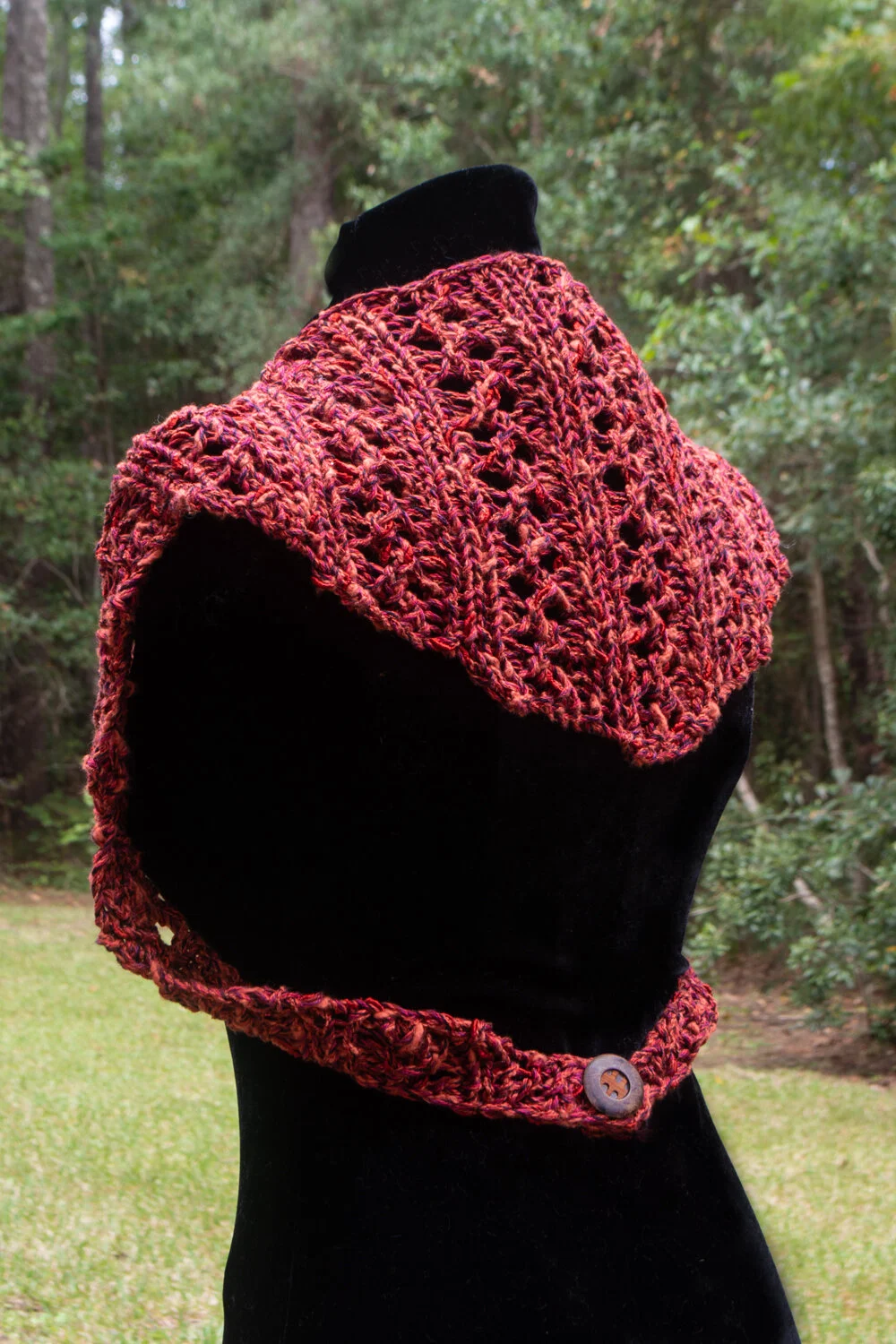 Red-orange 3-way as a Shrug, back view