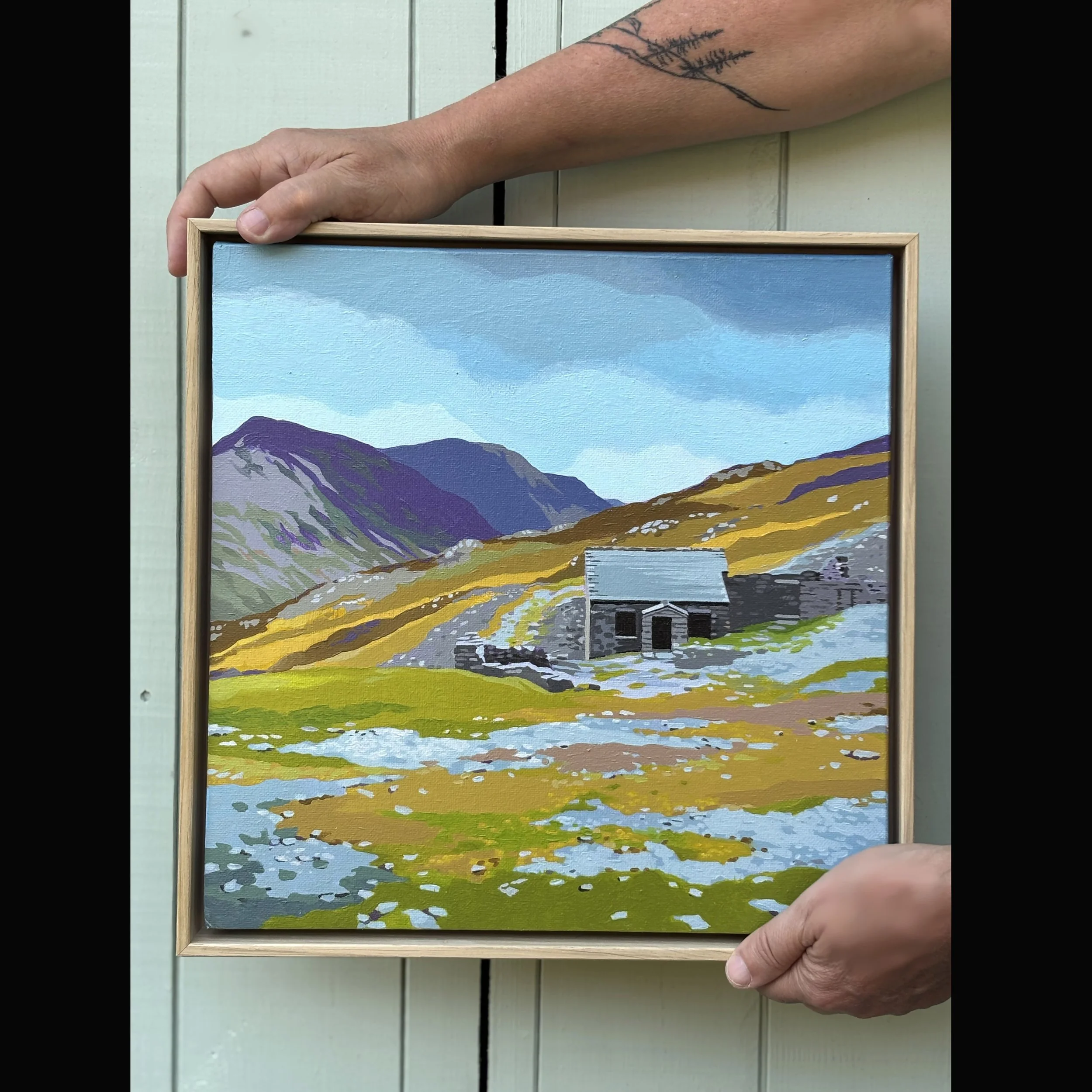 holding Dubs painting.jpg