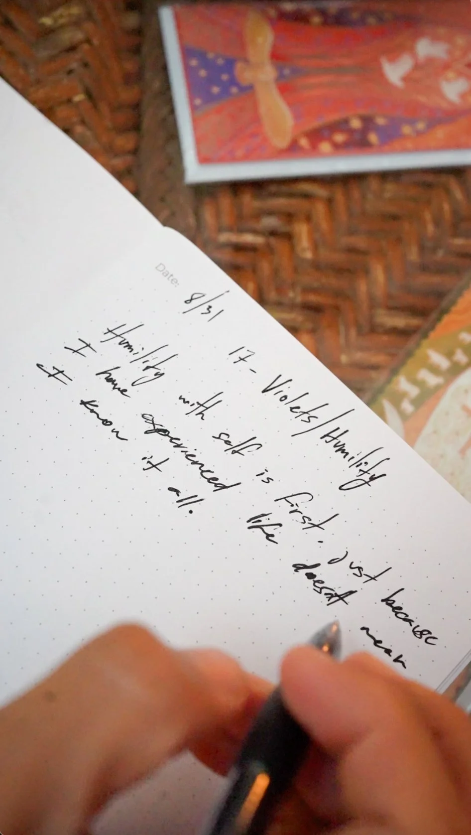 Close-up of a handwritten journal entry on reflection and humility, written during a creative writing retreat 