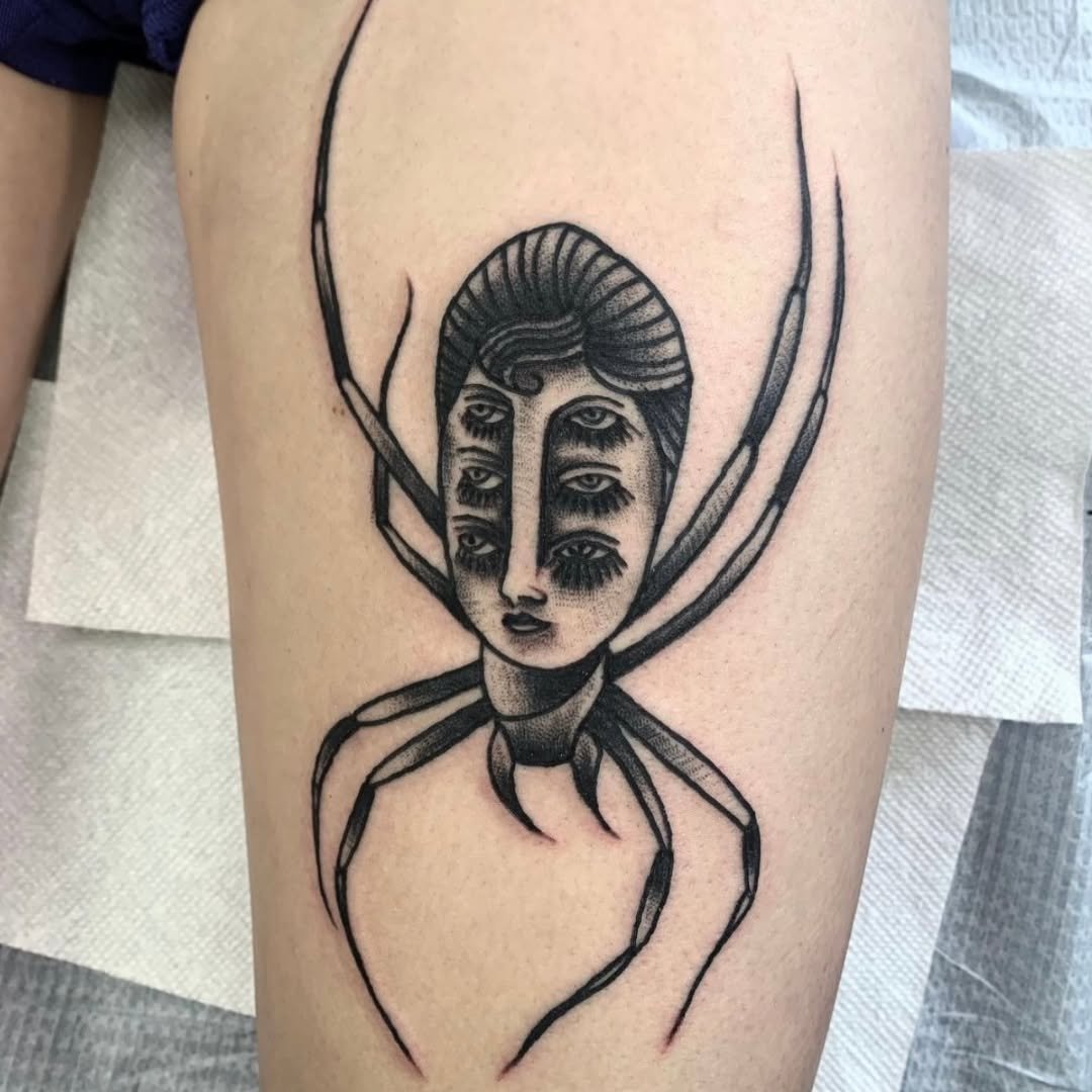 Zack recently inked this sick surrealist blackwork piece that is guaranteed to turn heads. This design features a multi-eyed head perched atop the body of a slender spider, creating a haunting and hypnotic visual.

Whether you have a surreal vision o