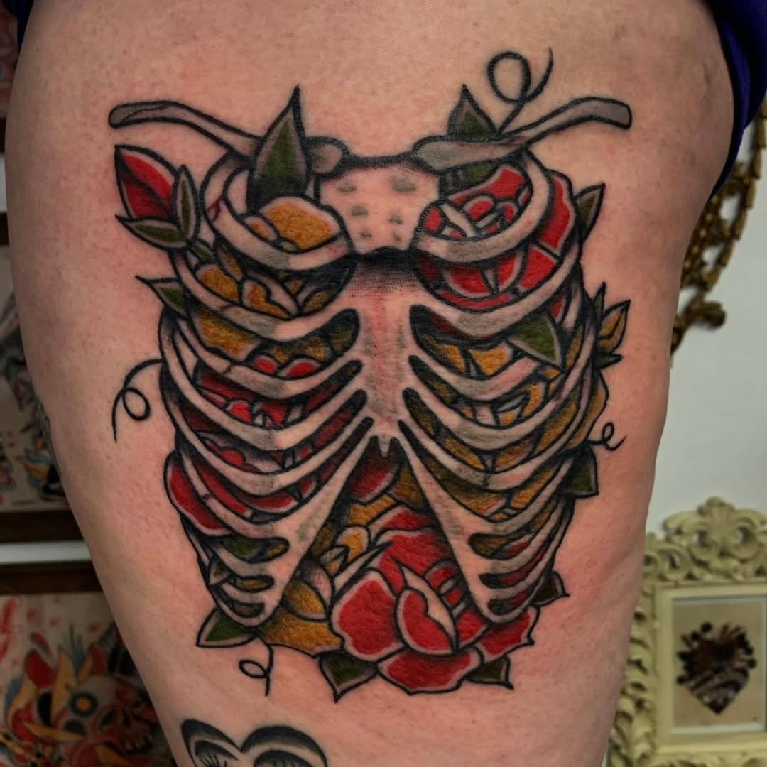 Check out this killer piece by Zack, a finely detailed ribcage packed to the brim with vibrant yellow and red roses! The rich color contrast paired with crisp, solid blackwork makes this custom design pop right off the skin. 🥀💛⚡️

Whether you are d