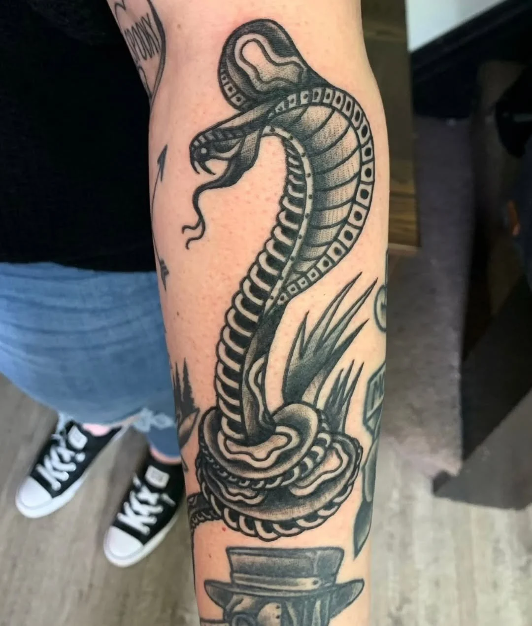 This sick blackwork King Cobra by Zack has it all, perfect shading, clean lines, and deep, saturated blacks! It is the perfect ink for anyone who wants to say "Approach with caution" without uttering a single word. 🐍⚡️🖤 

Whether you are 