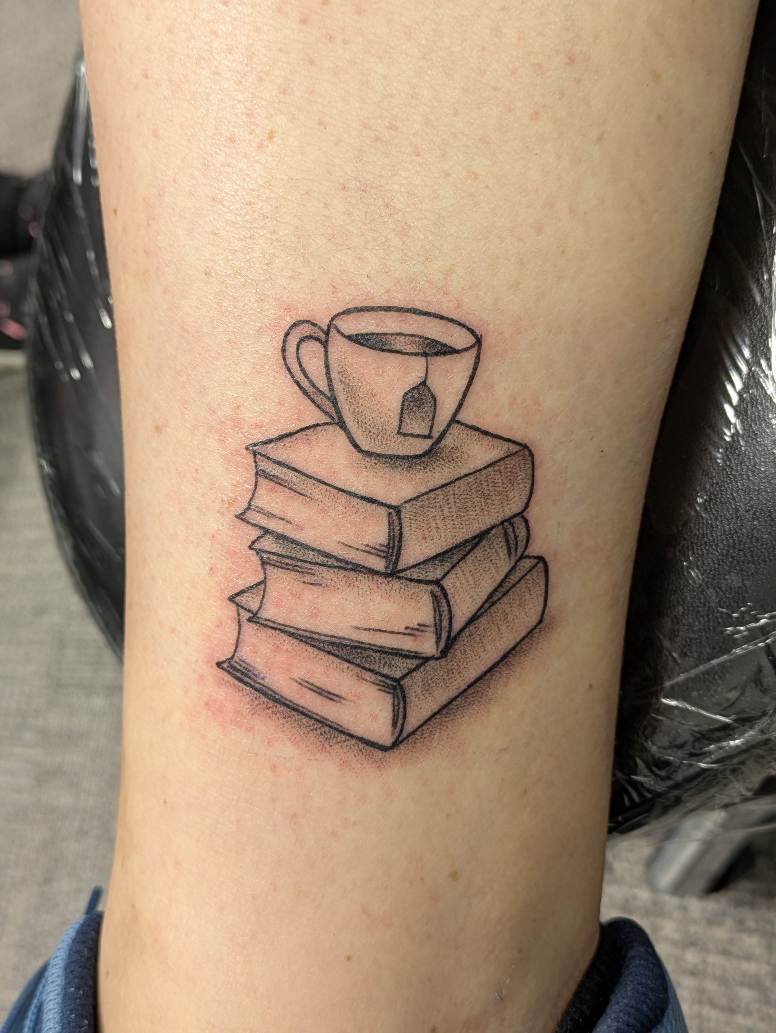Flash Teacup on book stack