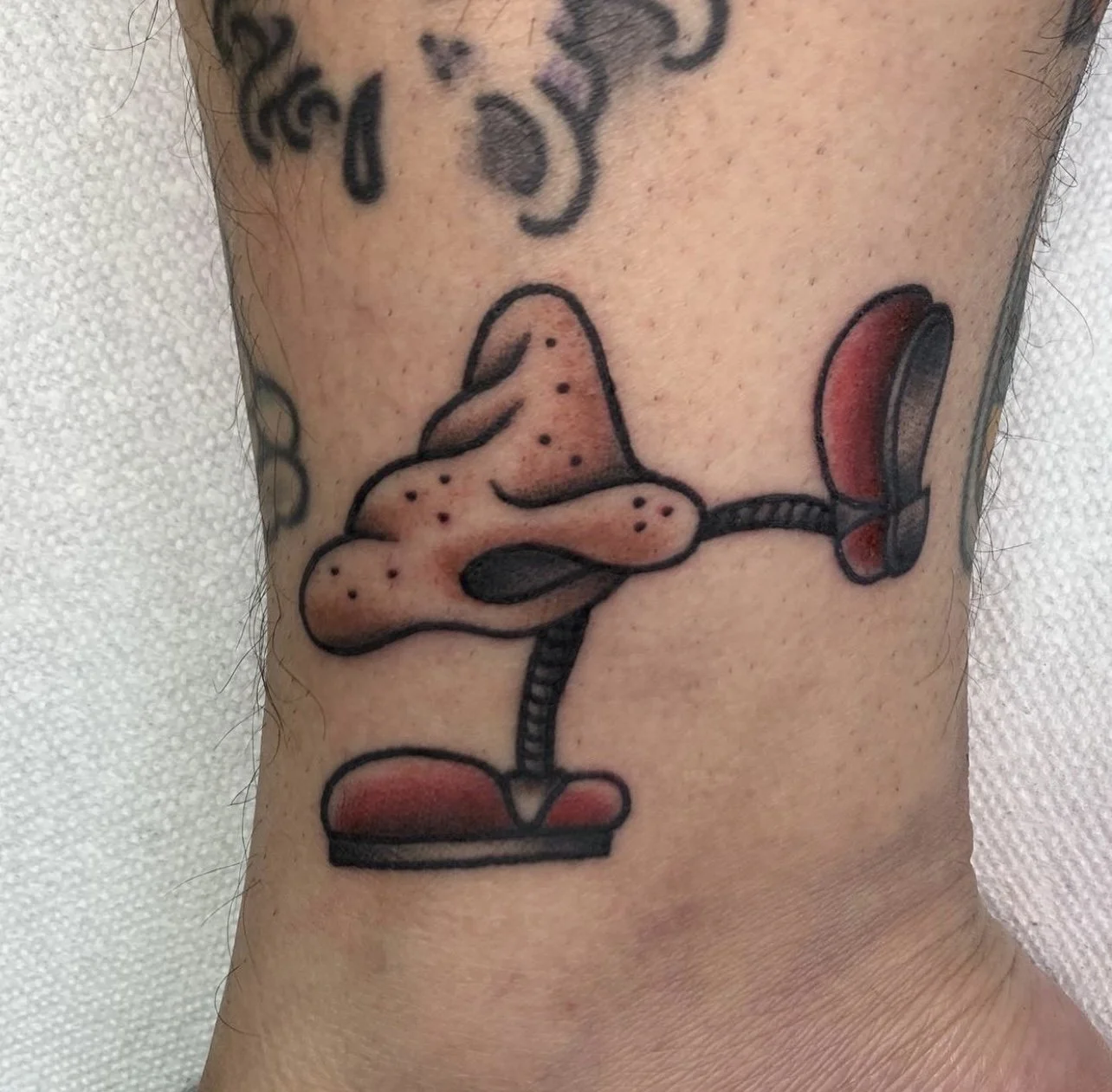 Anthropomorphic nose with red shoes
