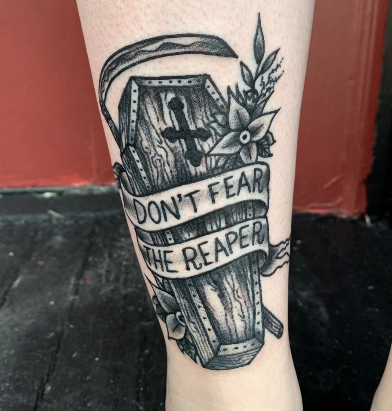 Blackwork coffin with banner