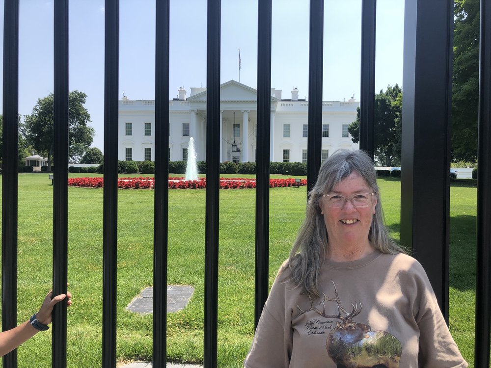 Mavis in front of the White House. Not so long ago we could have taken a tour. :(