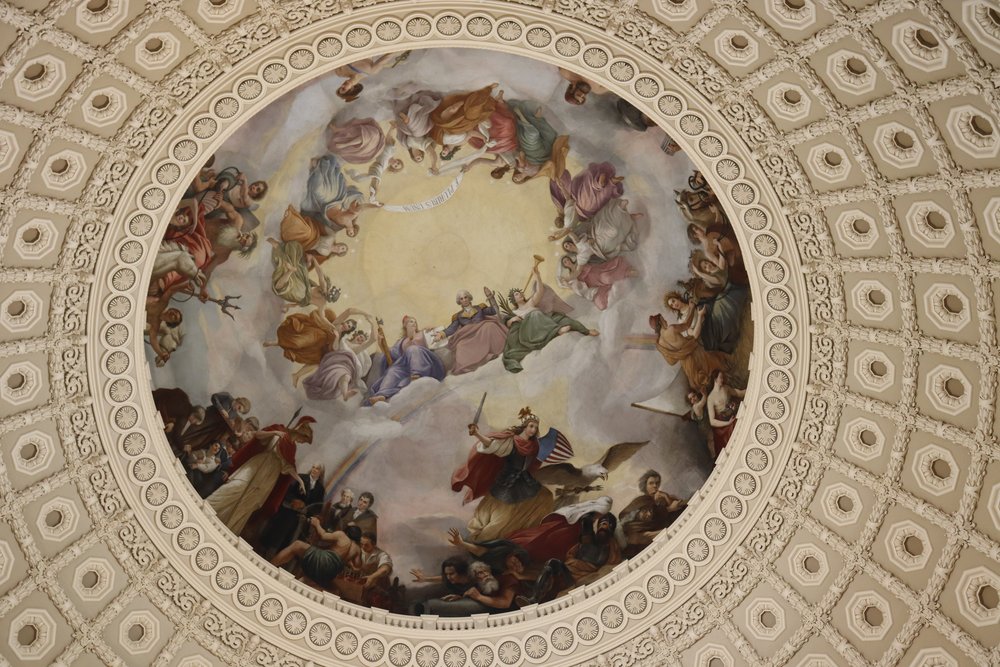 The ceiling of the rotunda. George Washington is wearing blue with a kind of lavender lap blanket.