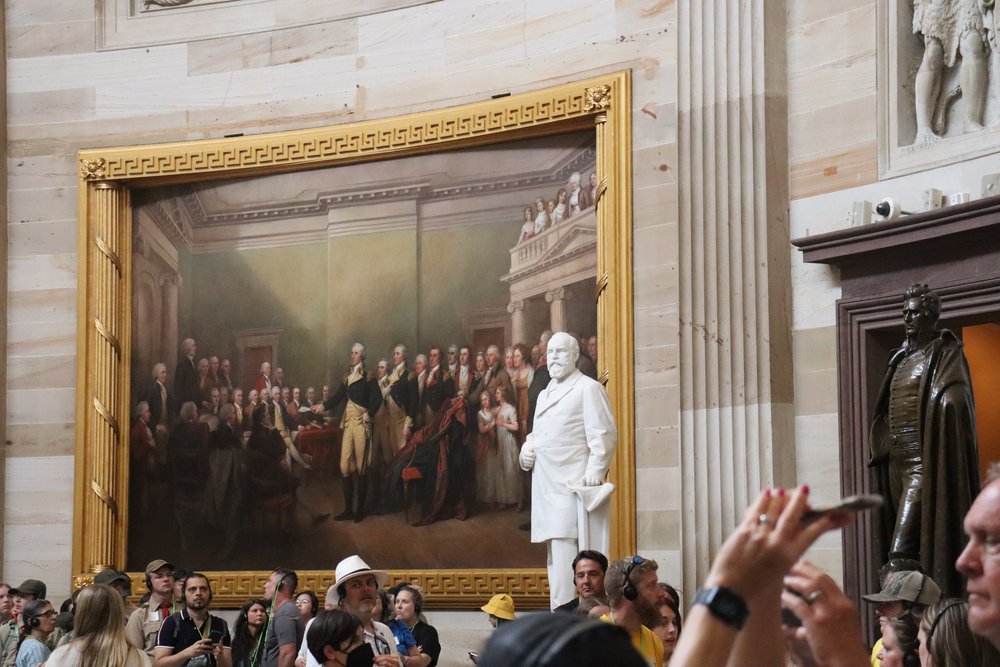 In the rotunda of statues.