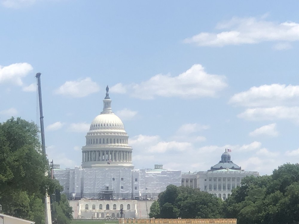A rare shot (for this visit) with blue skies! One side is the Senate and the other the House of Representatives chambers. A flag flies over the side(s) when they are in session.