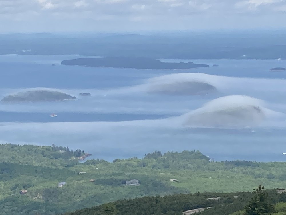 Those "fog bumps" are fog enveloping the islands out there.
