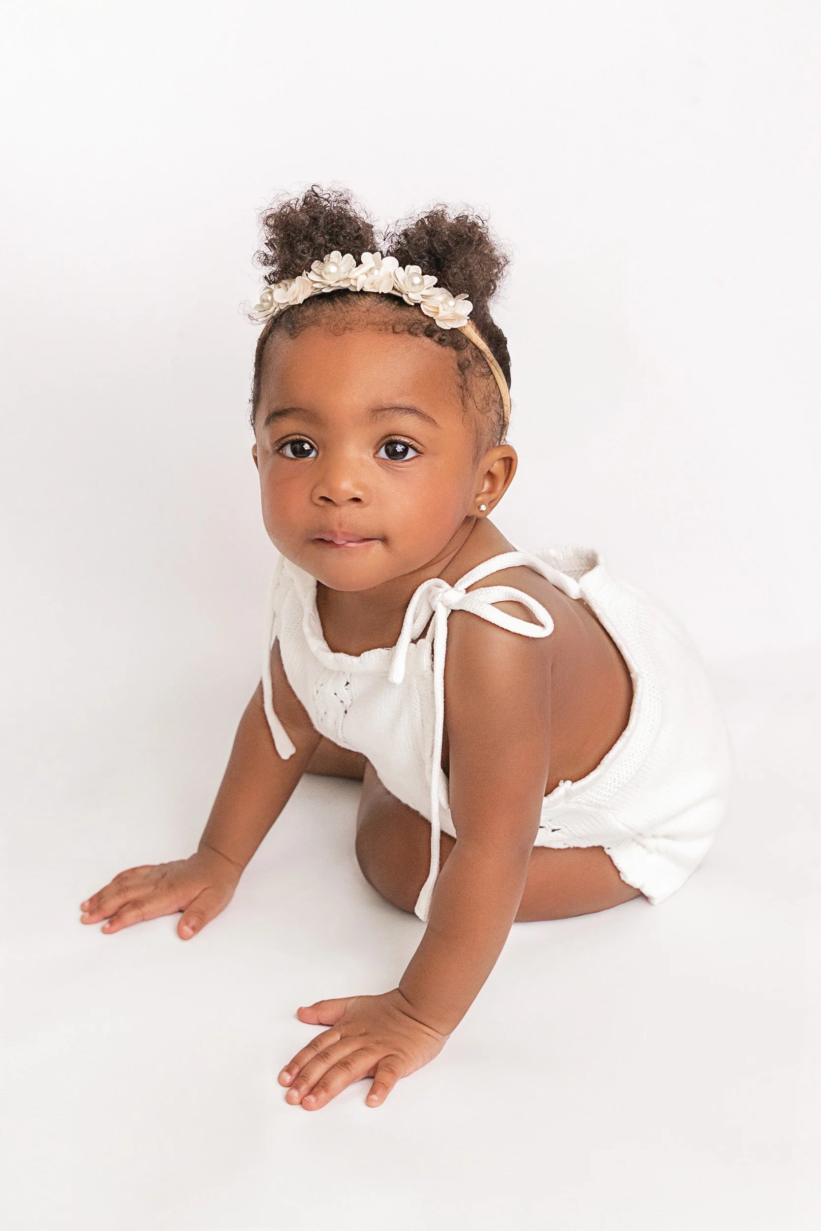 one year old baby playing at home during milestone session Trinity Florida