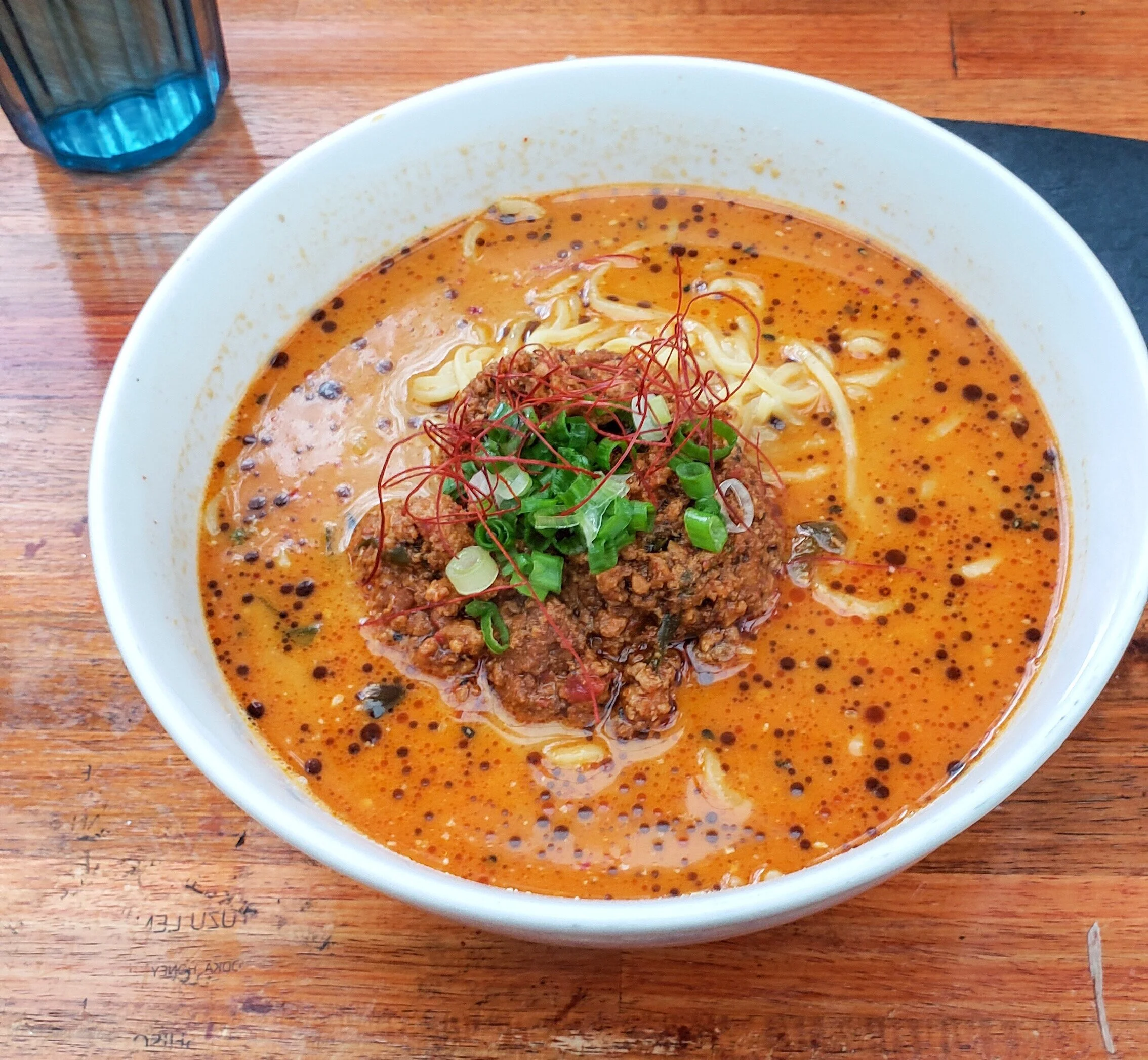 Rich-brothed Dan Dan Noods. Photo: Stew’s The Beef. Edit: Naomi Kimi.