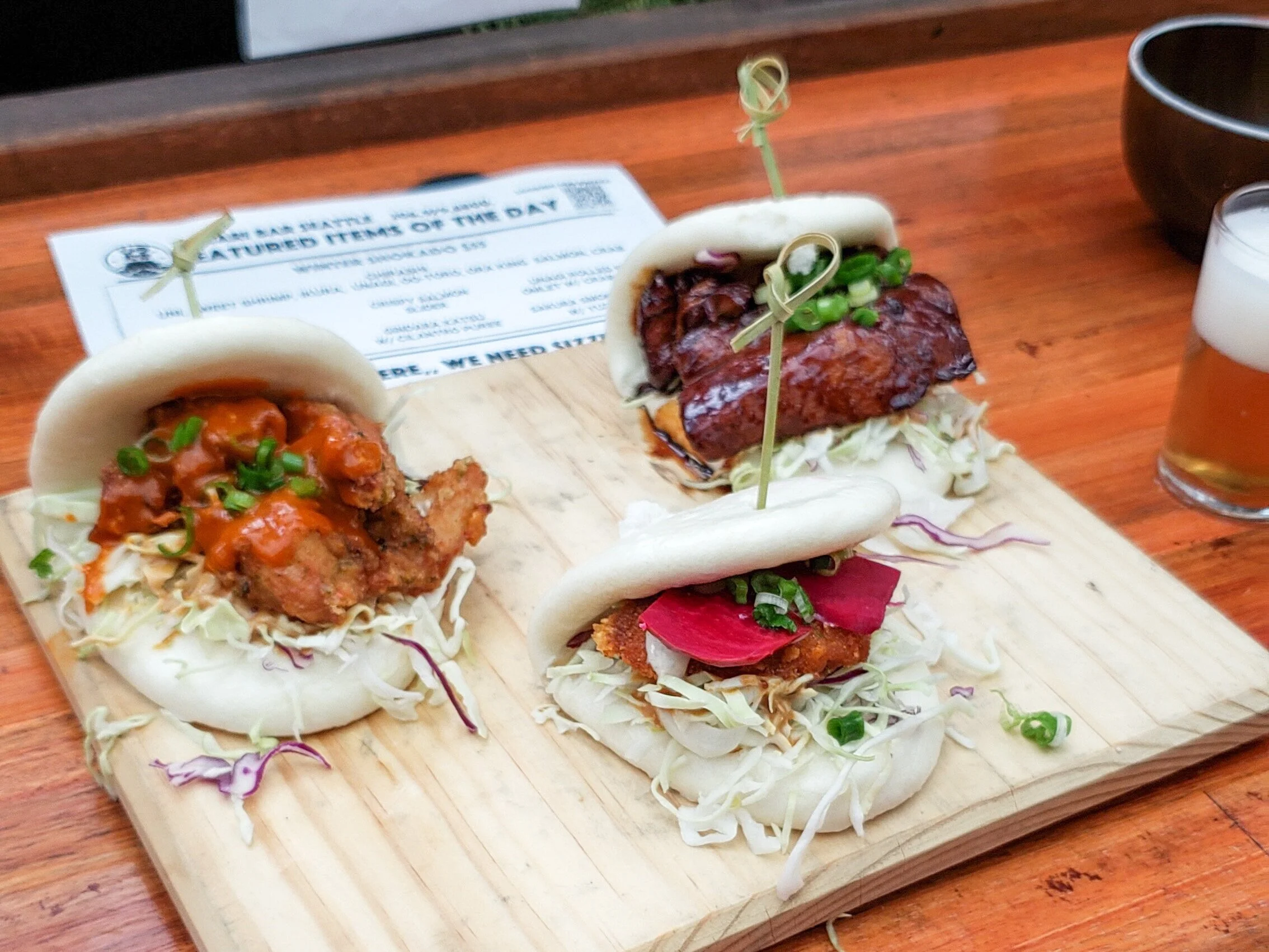 Karaage, fried fish &amp; pork belly bao options. Photo: Stew’s The Beef. Edit: Naomi Kimi.