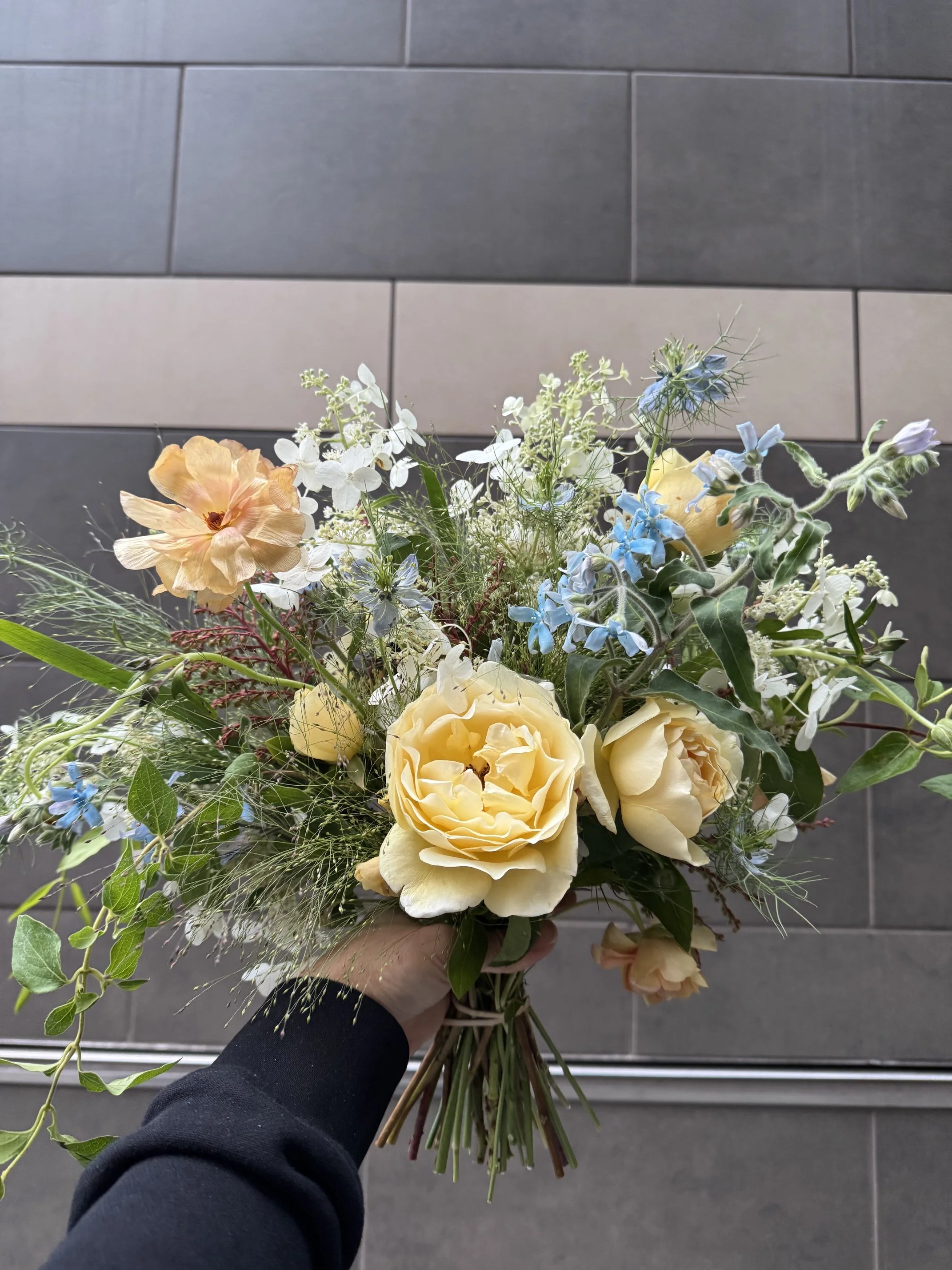 yellow blue bridal bouquet with texture