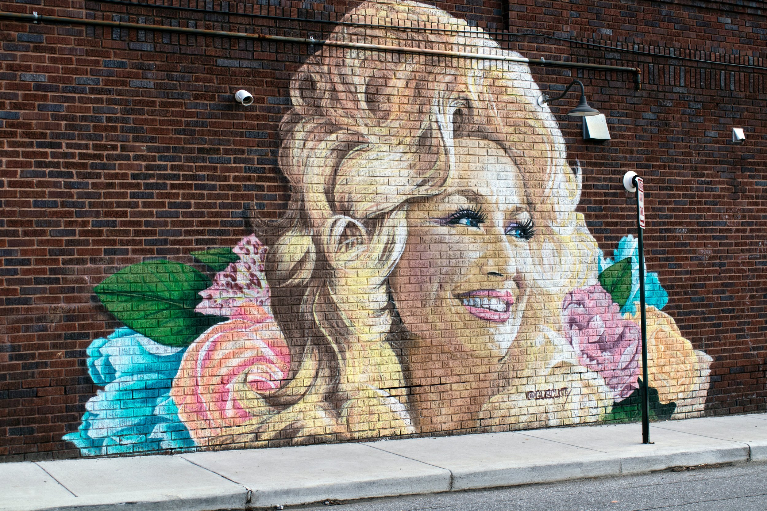Remembering Dolly Parton’s Legacy of Humanitarianism