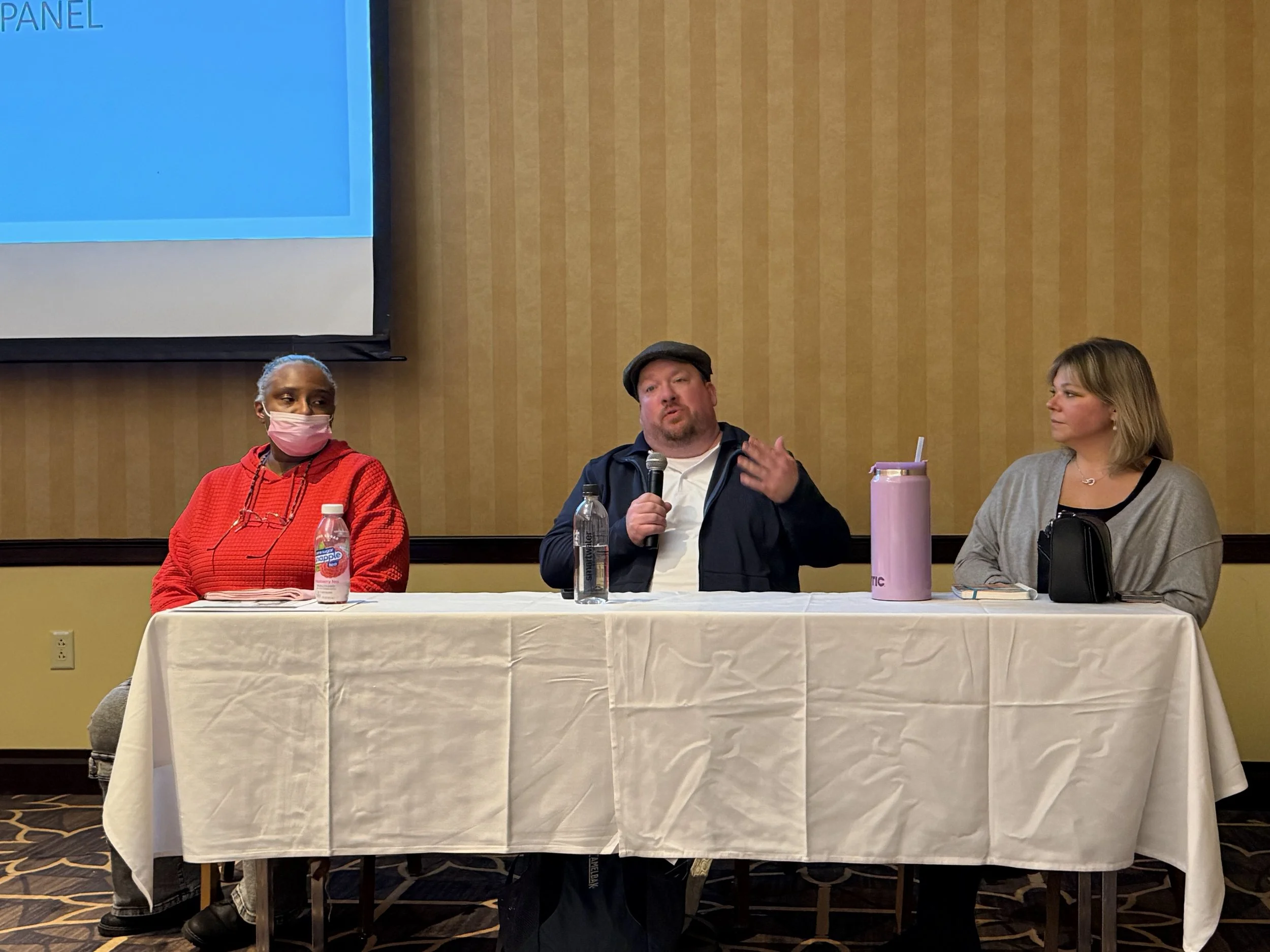 Sgt. of Arms/#1 Trustee/Region 15 Primary DRT NALC Representative speaks during DRT Panel