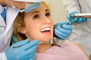Teenager being examined for possible dental veneer treatment