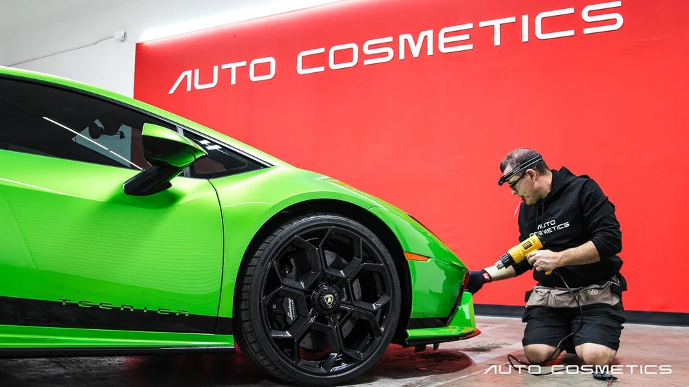 Clear bra paint protection film on a green Lamborghini at Auto Cosmetics in Chandler, Arizona