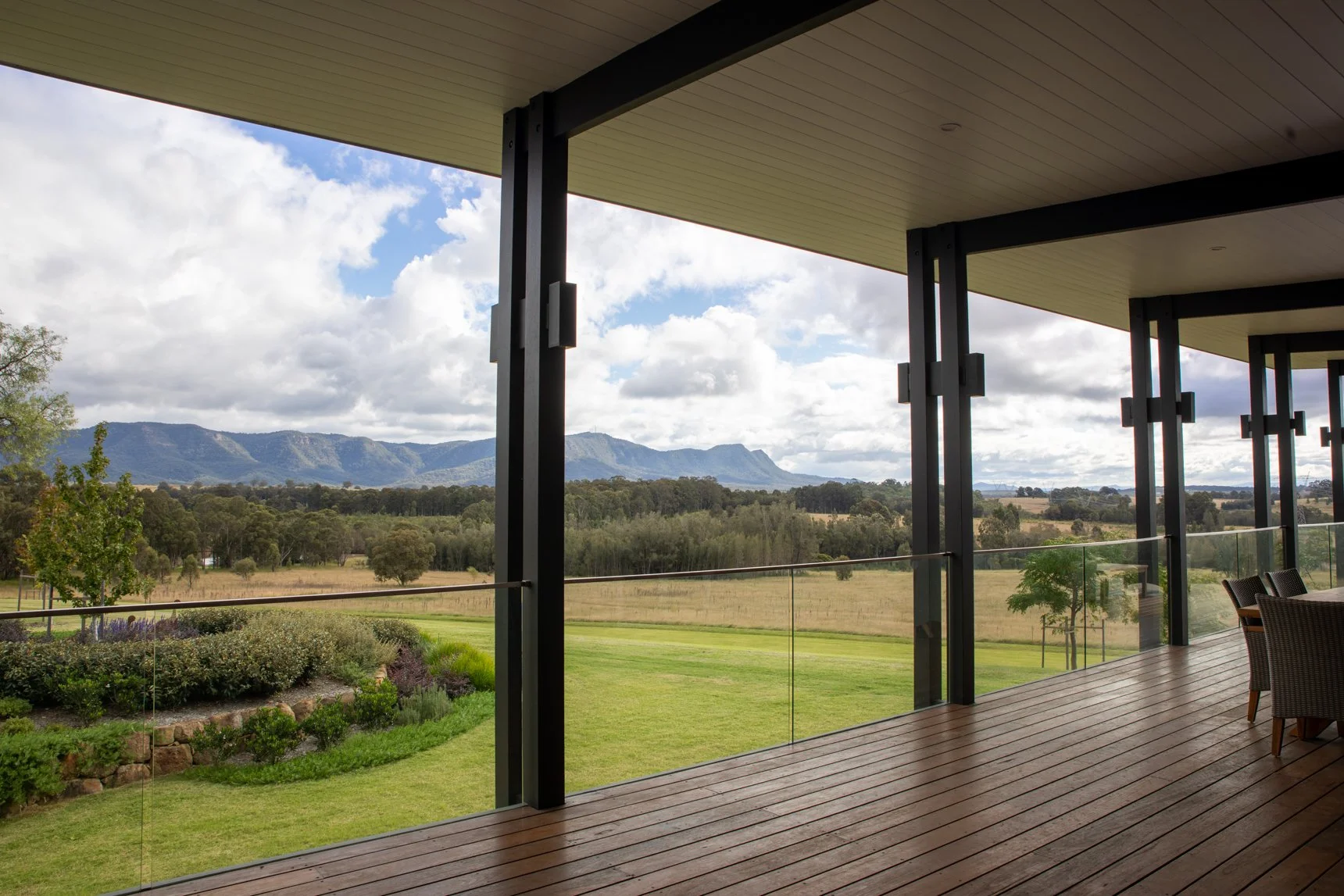 Home builders Hunter region patio with mountain and field views.