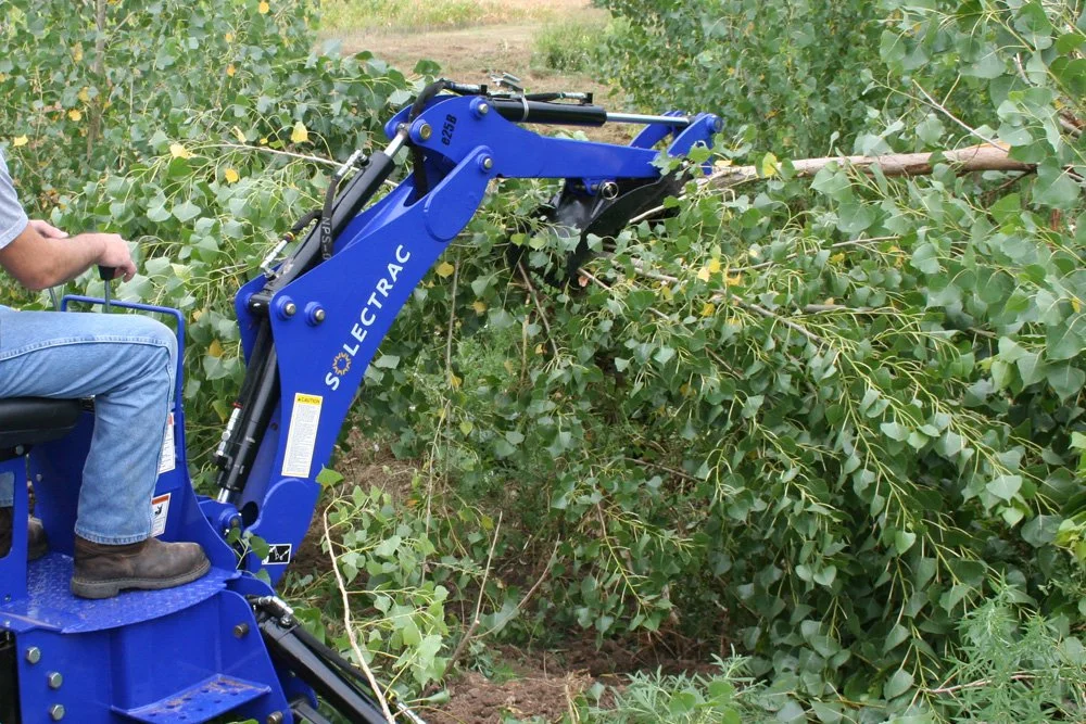 e25 Electric Tractor with Backhoe — Solectrac