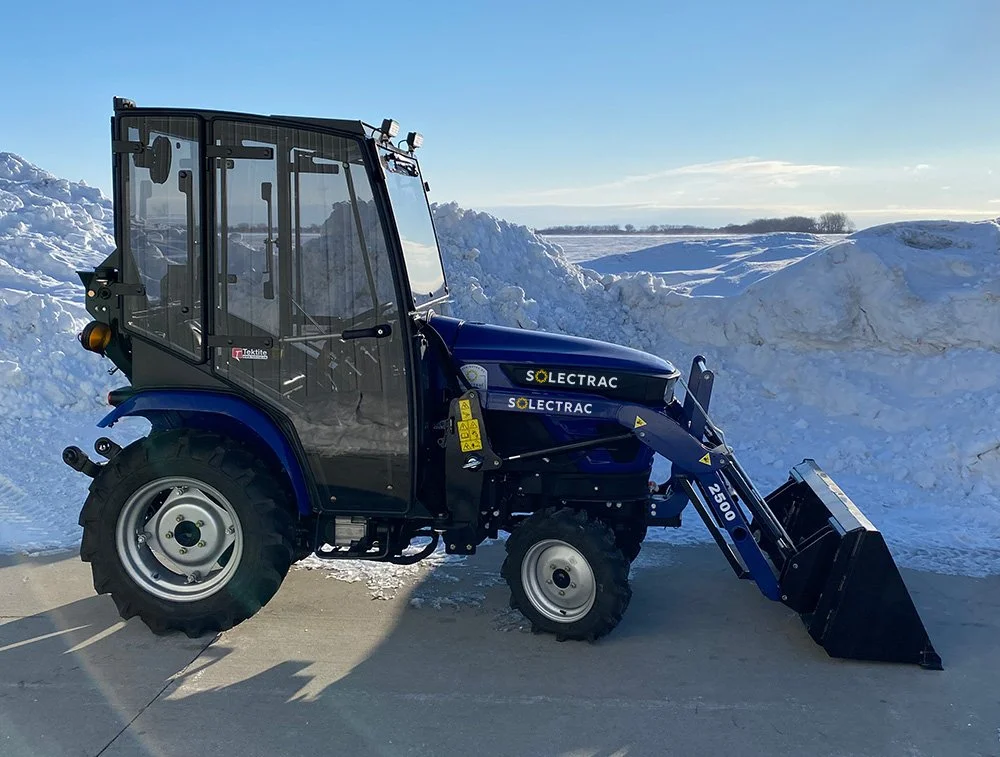 Solectrac-e25-Electric-Tractor-Tektite-Cab-Snow.jpg