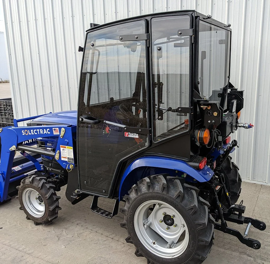 Solectrac-e25-Electric-Tractor-Tektite-Cab-Side.jpg