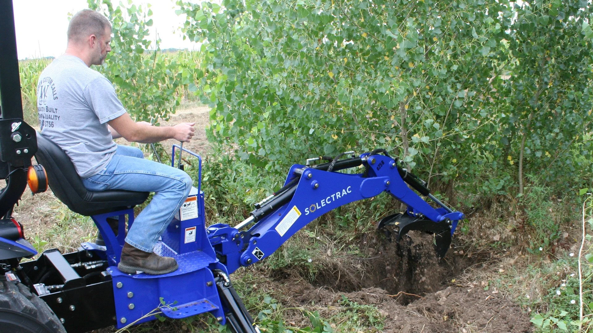 e25 Electric Tractor with Backhoe — Solectrac