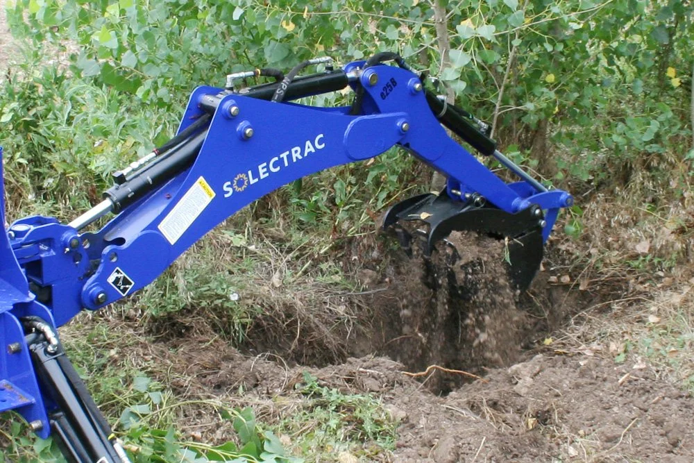 e25 Electric Tractor with Backhoe — Solectrac