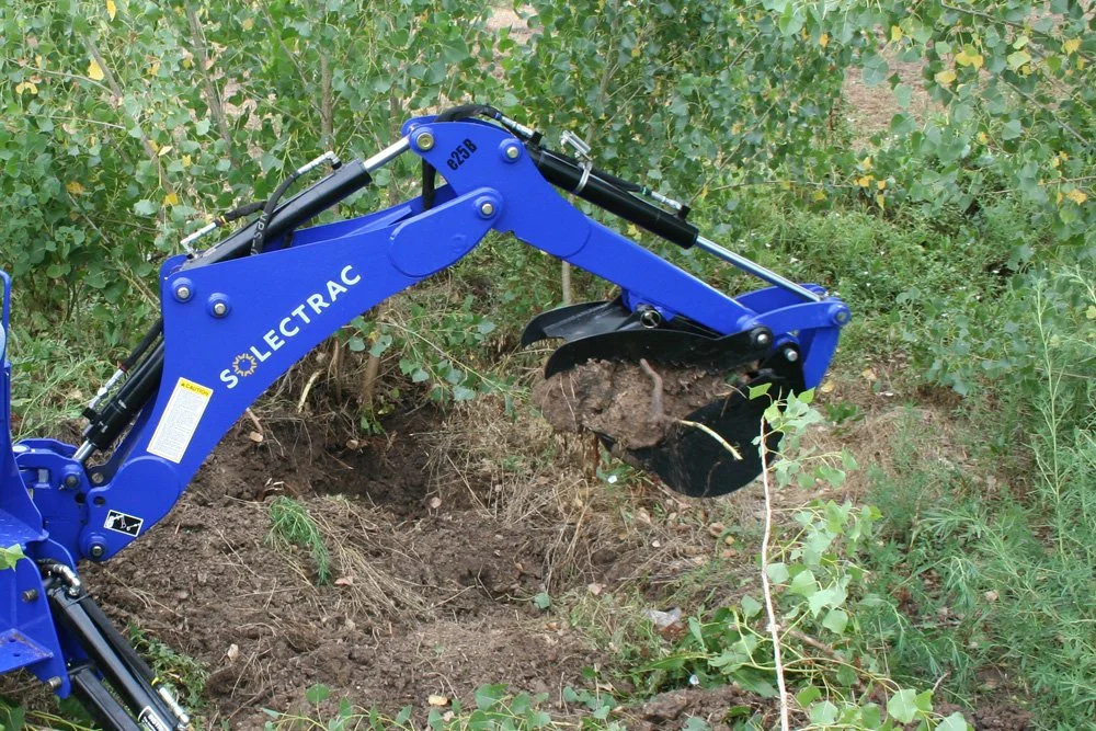 e25 Electric Tractor with Backhoe — Solectrac