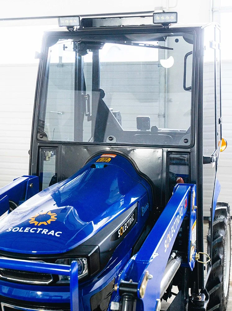 Solectrac-e25-Electric-Tractor-Tektite-Cab-Front-02.jpg