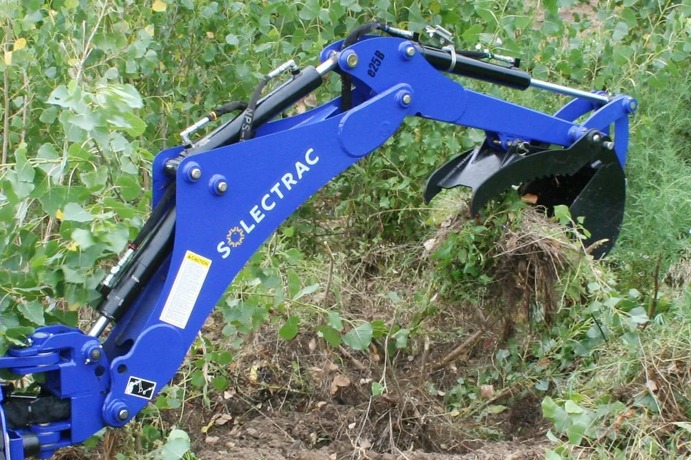 e25 Electric Tractor with Backhoe — Solectrac