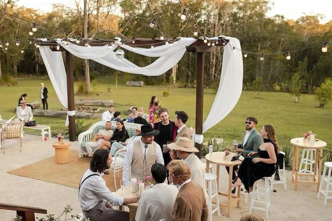 Shekhina &amp; Gab set up was incredible- Disco lights hung from inside the pavilion and outside dining with this stunning sash through the arbour. 📸 @chrisgrundyphoto 🥗@coastalharvest_