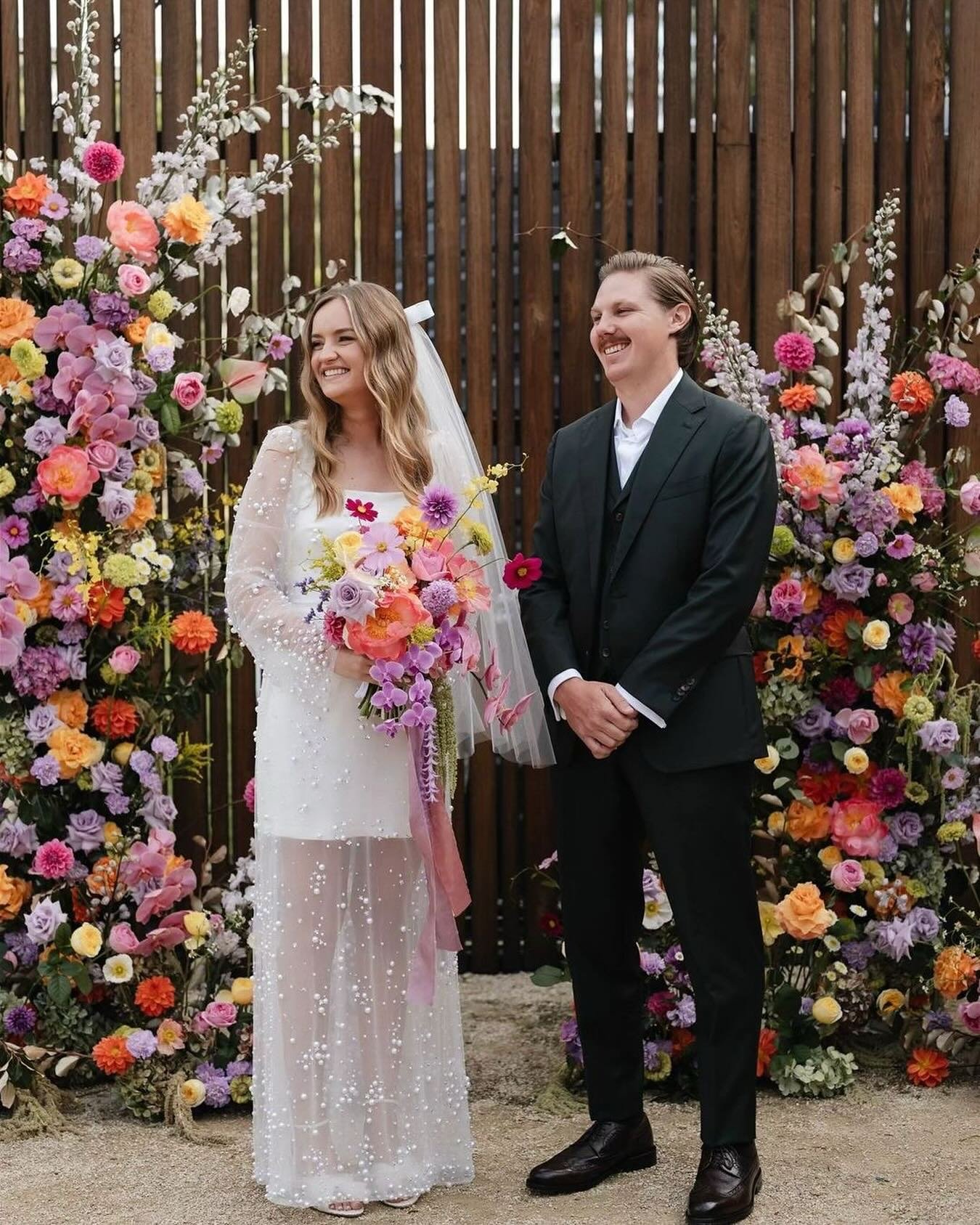 April &amp; Lachie had a crew of amazing vendors bring their day together. The colours from @thebearnative and this instal was something else 🔥✨