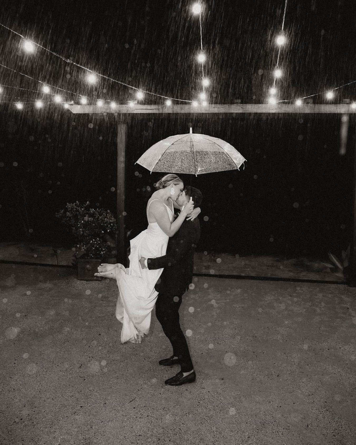 Julia &amp; Jack making the most of the rain!
A wet knot is harder to undo ✨ #crescentheadwedding #destinationwedding #midnorthcoastweddings