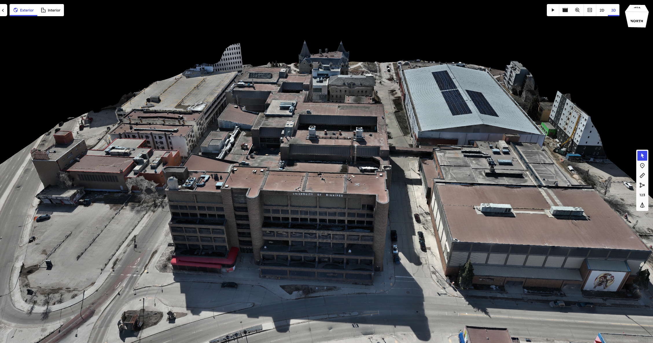 Aerial 3D view of the University of Winnipeg campus and surrounding downtown buildings in Winnipeg, Manitoba winnipeg aerial roof and building envelope inspections service