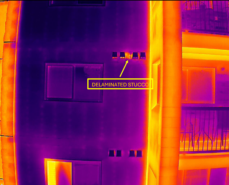 Thermal imaging view of a building facade showing delaminated stucco around wall fixtures. winnipeg aerial roof and building envelope thermal inspections service
