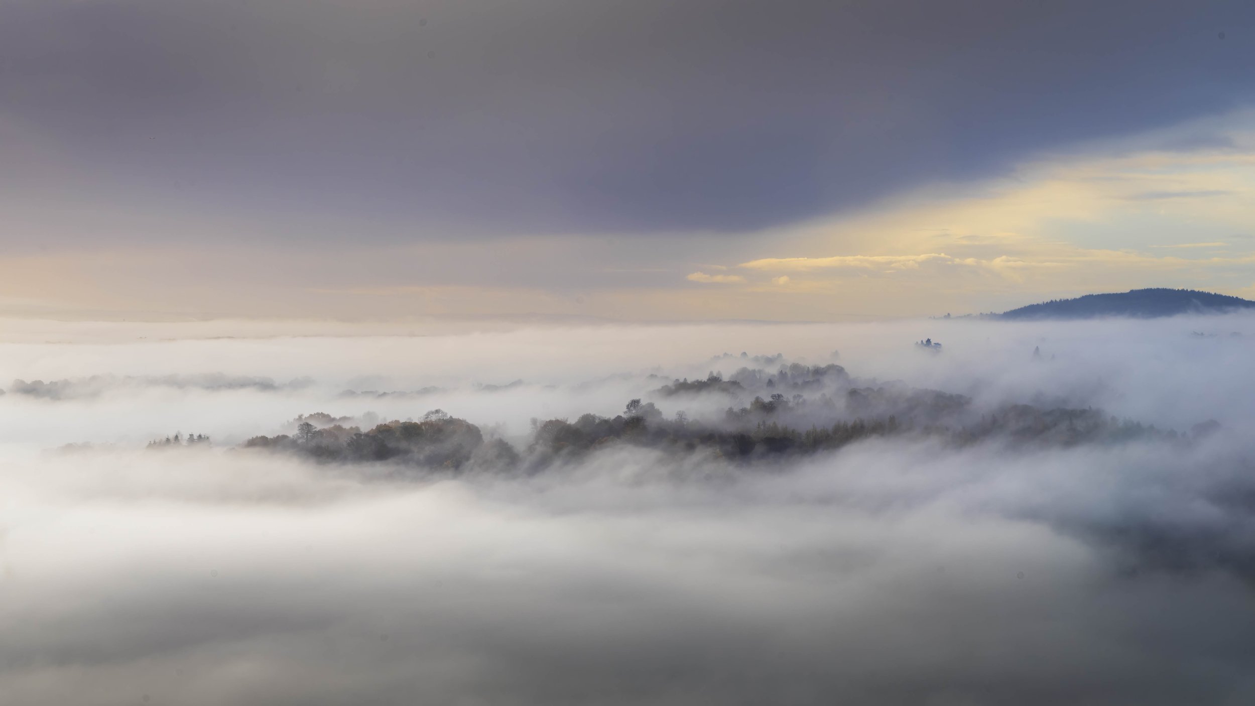 Temperature inversion and stormy clouds